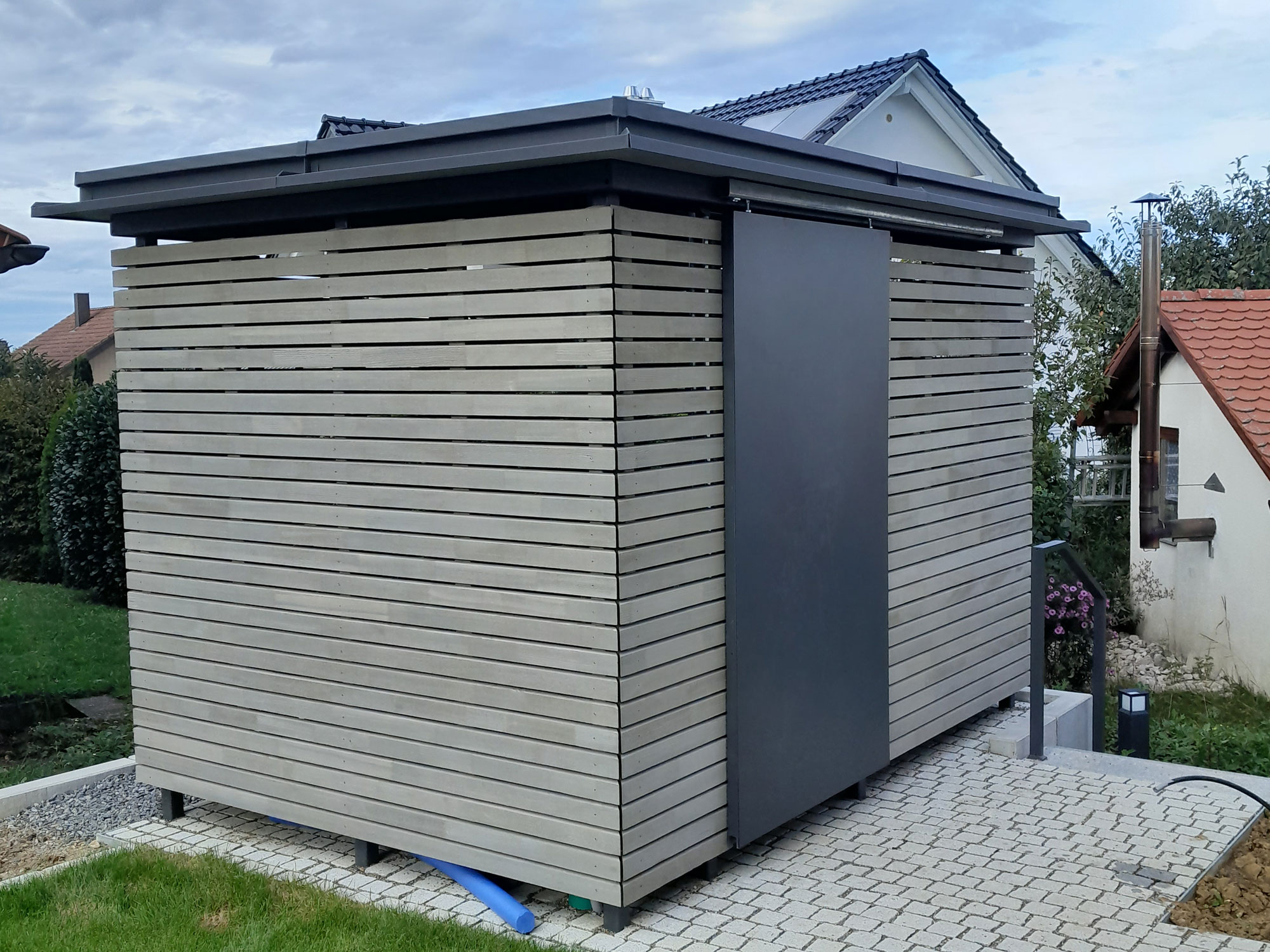 Referenzbild Mülltonneneinhausung